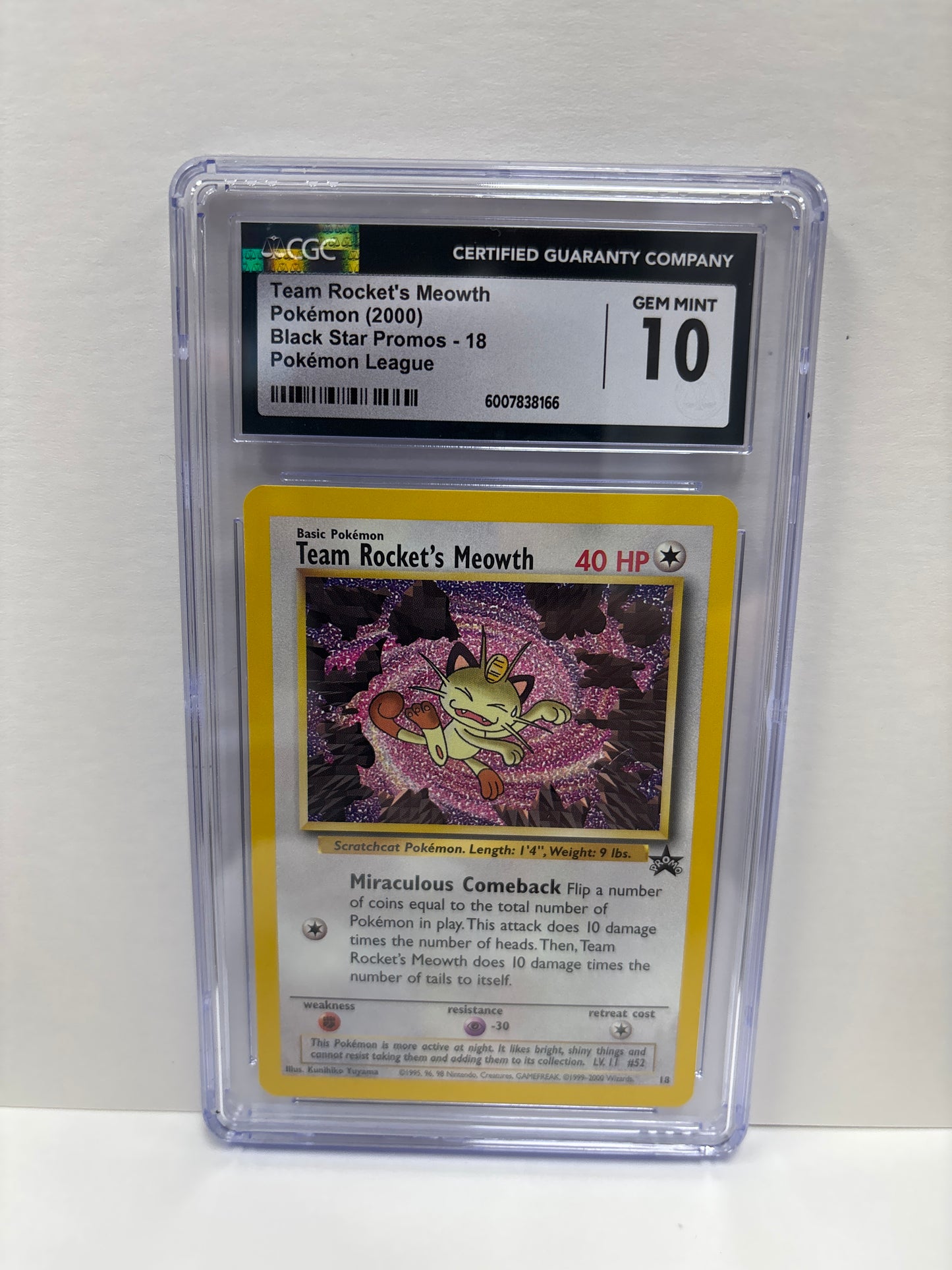 Pokemon Team Rocket’s Meowth 18 (2000) CGC 10