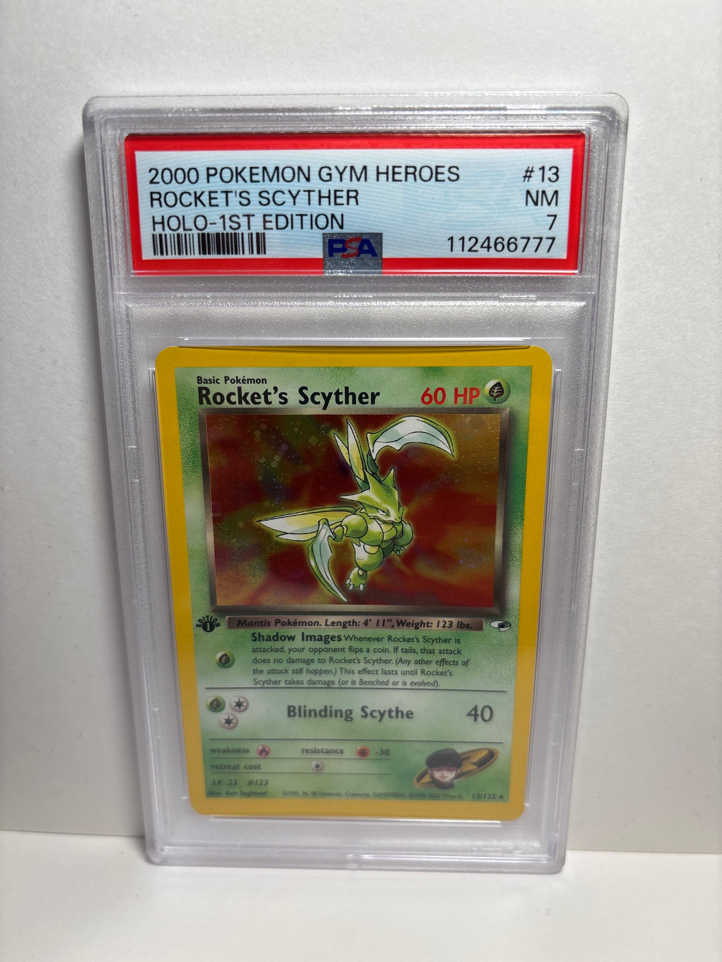 Pokemon Rocket’s Scyther 13/132 1st Edition (2000) PSA 7