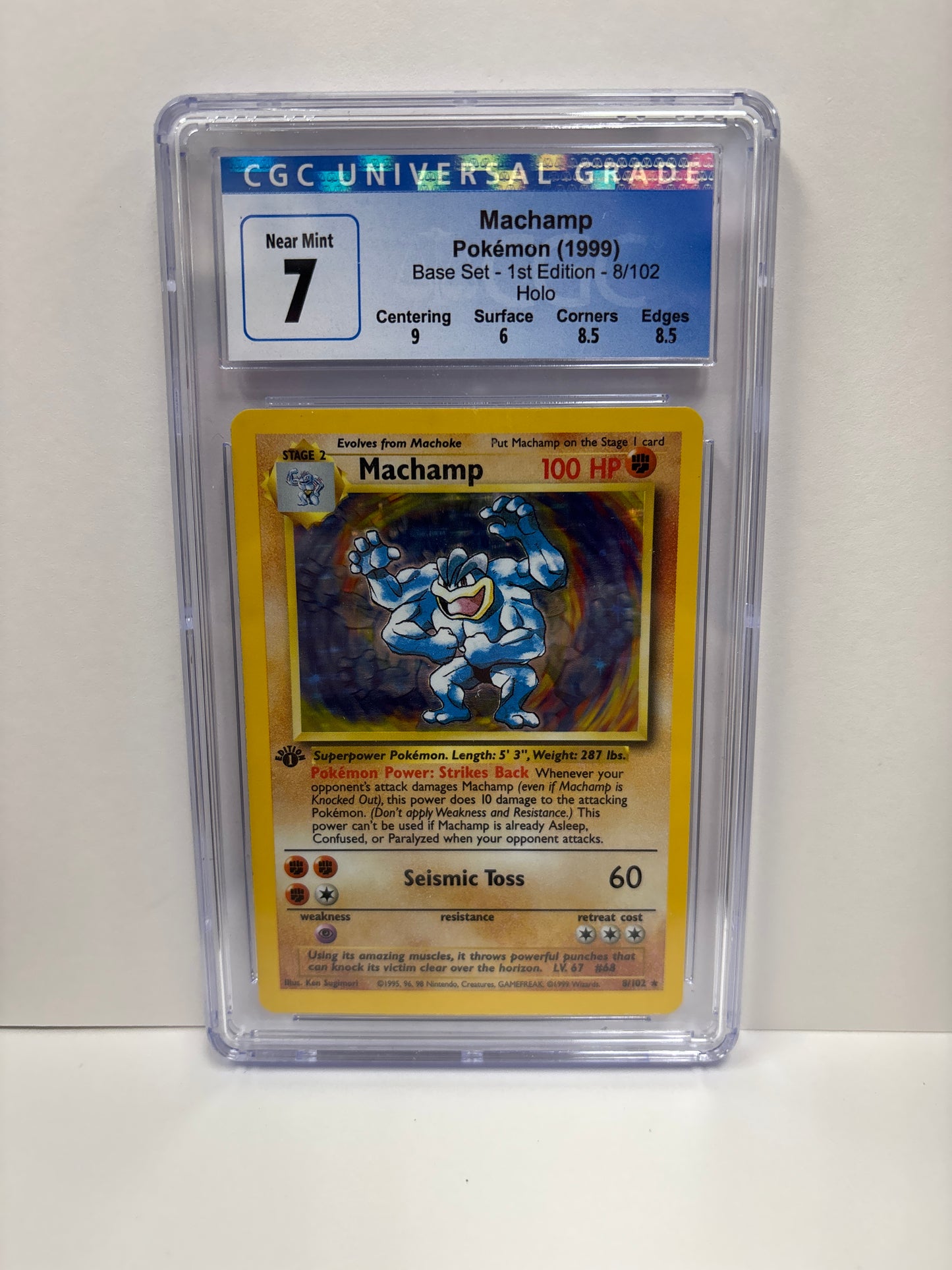 Pokemon Machamp 8/102 1st Edition (1999) CGC 7