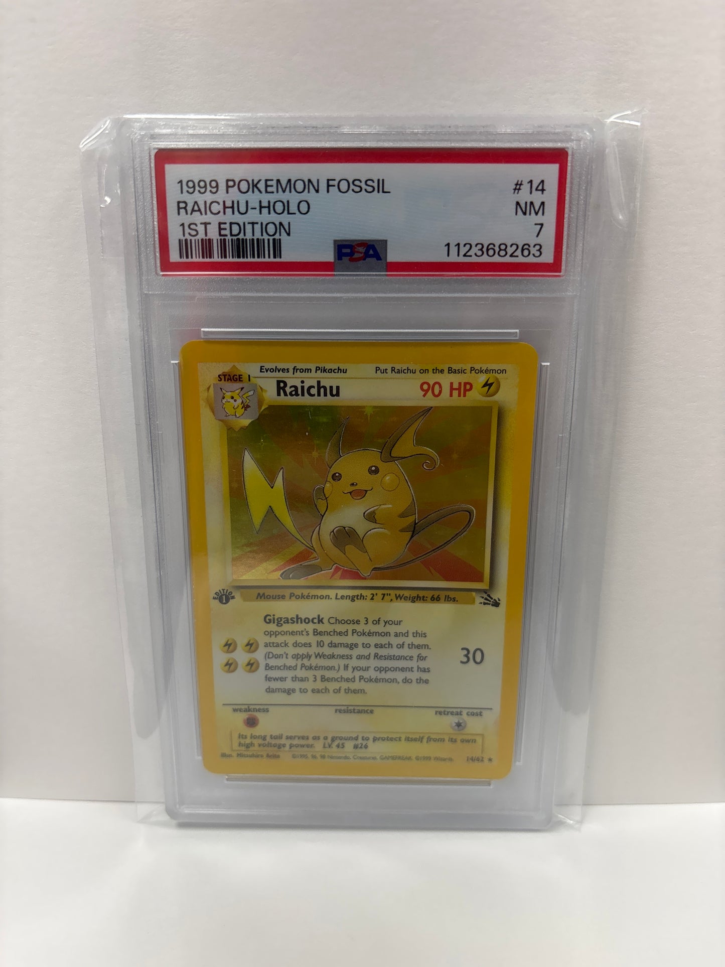 Pokemon Raichu 14/62 (1999) 1st Edition PSA 7