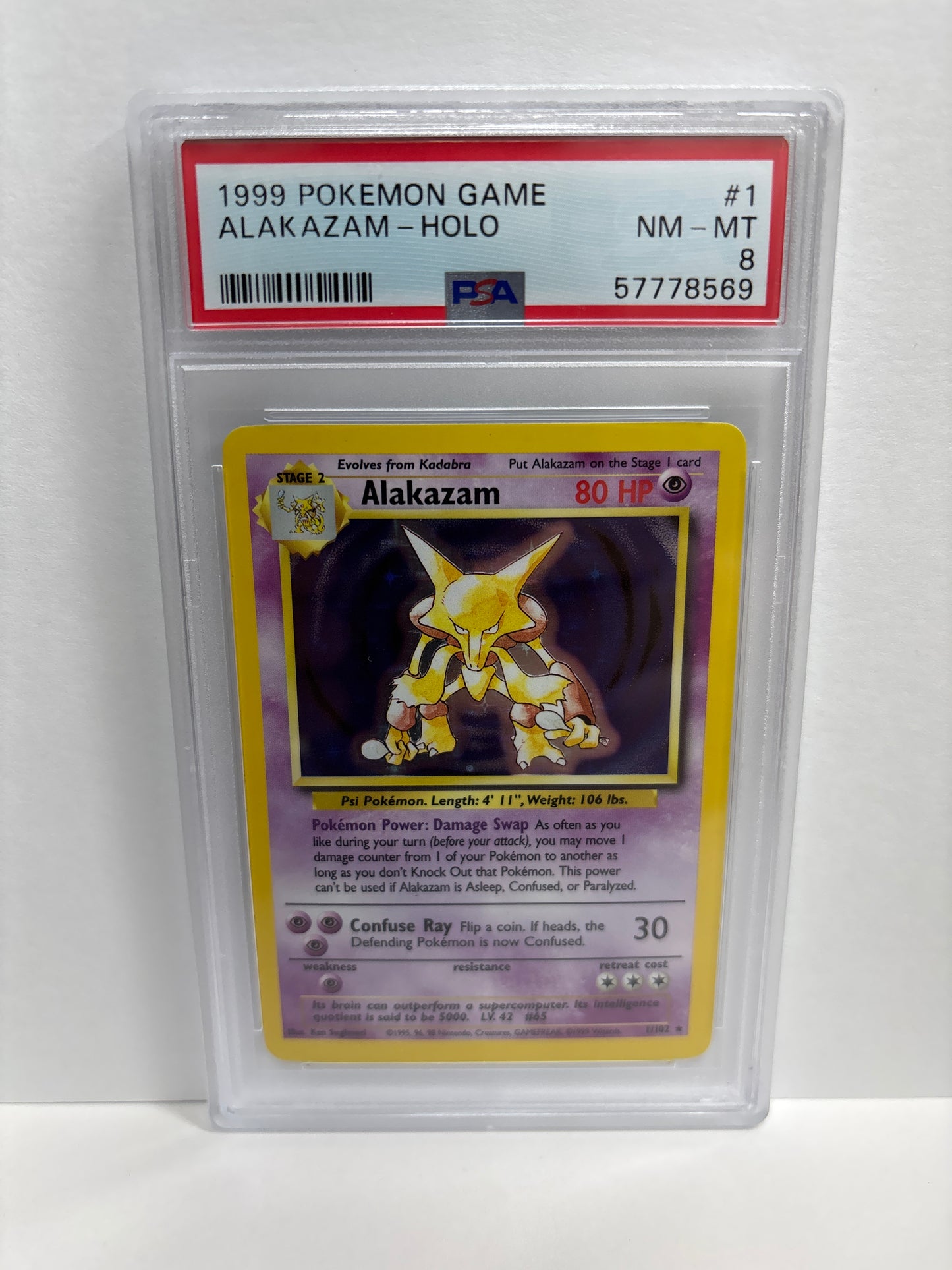 Pokemon Alakazam 1/102 (1999) PSA 8