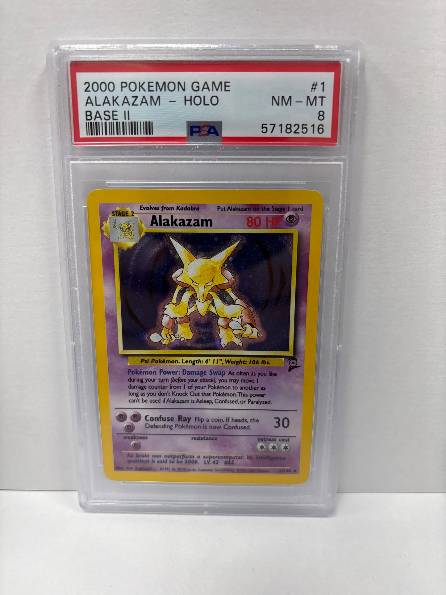 Pokemon Alakazam 1/130 (2000) PSA 8