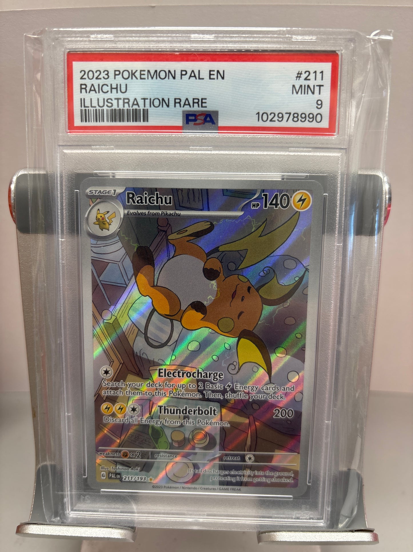 Pokemon Raichu 211/193 PSA 9