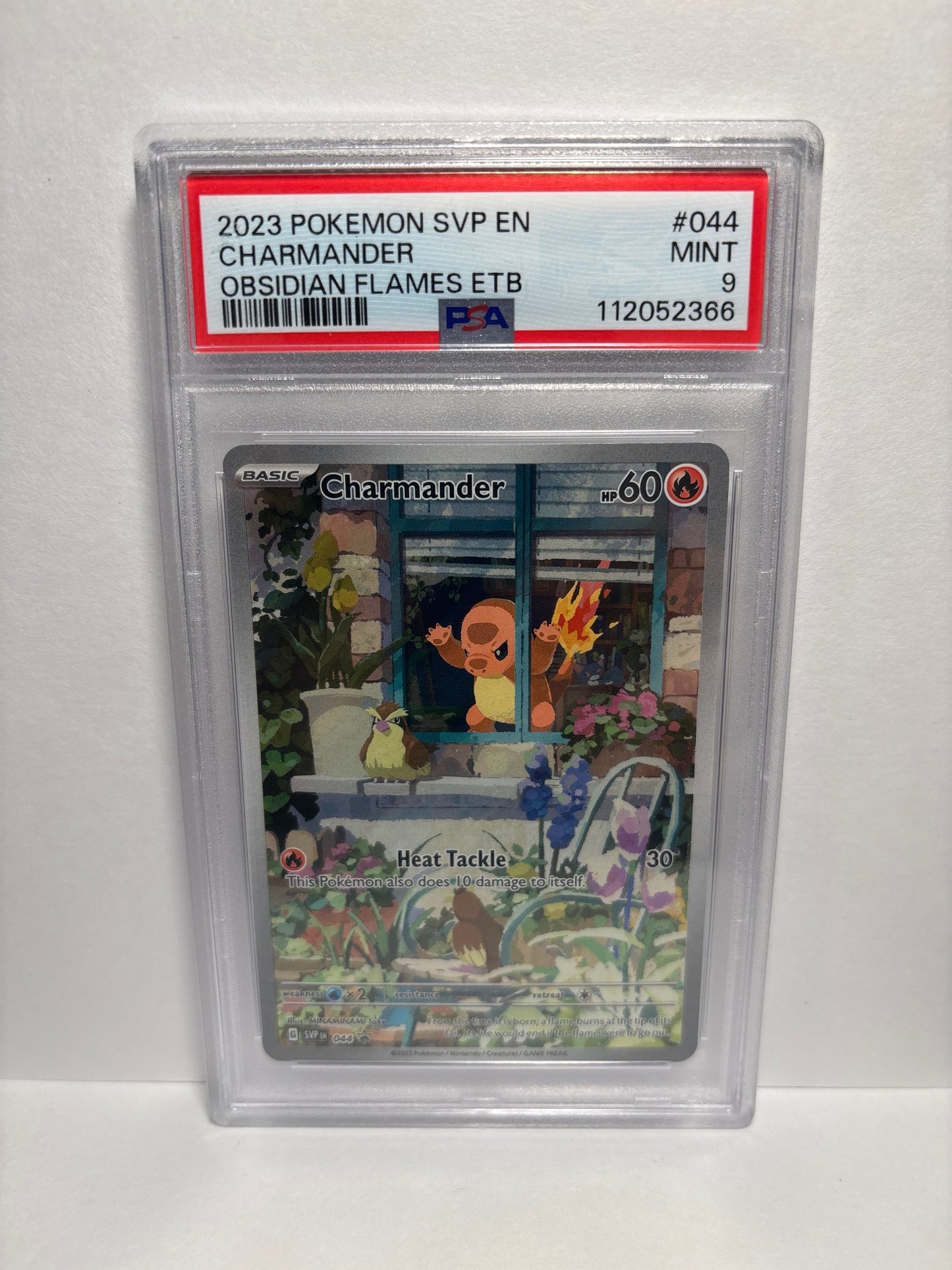 Pokemon Charmander 044 PSA 9 (Scratches on Slab)
