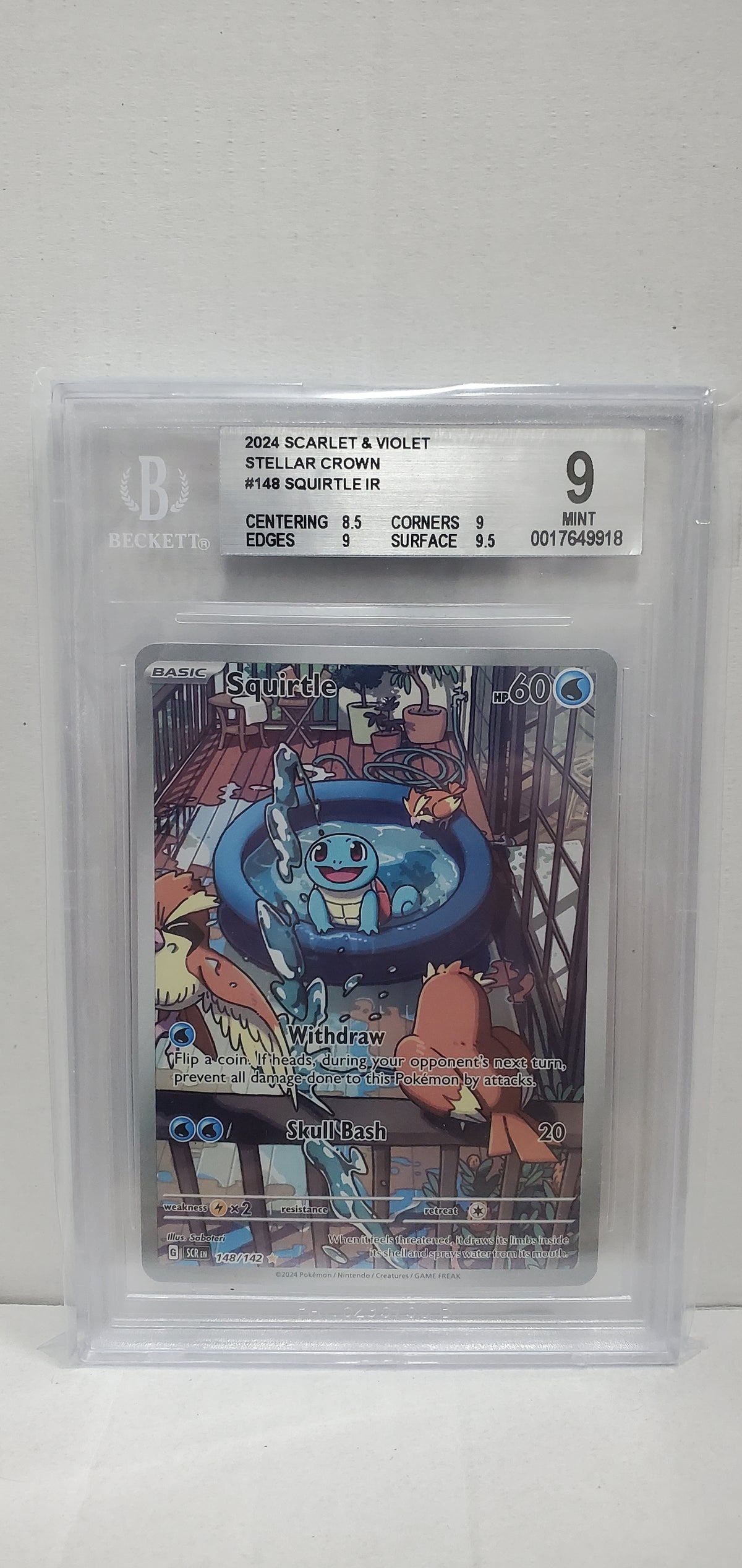 Pokemon Squirtle 148/142 Beckett 9