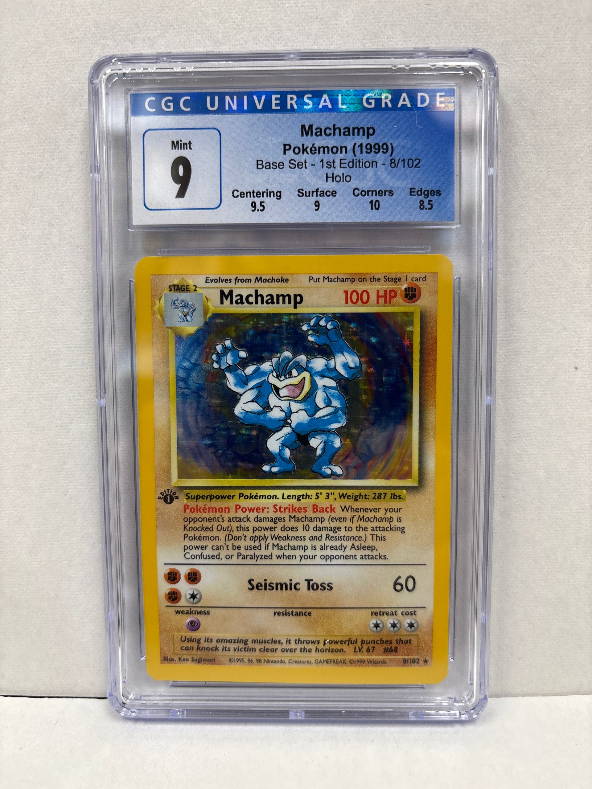 Pokemon Machamp 8/102 1st Edition (1999) CGC 9 Zapp! Comics Pokemon Machamp 8/102 1st Edition (1999) CGC 9 Zapp! Comics