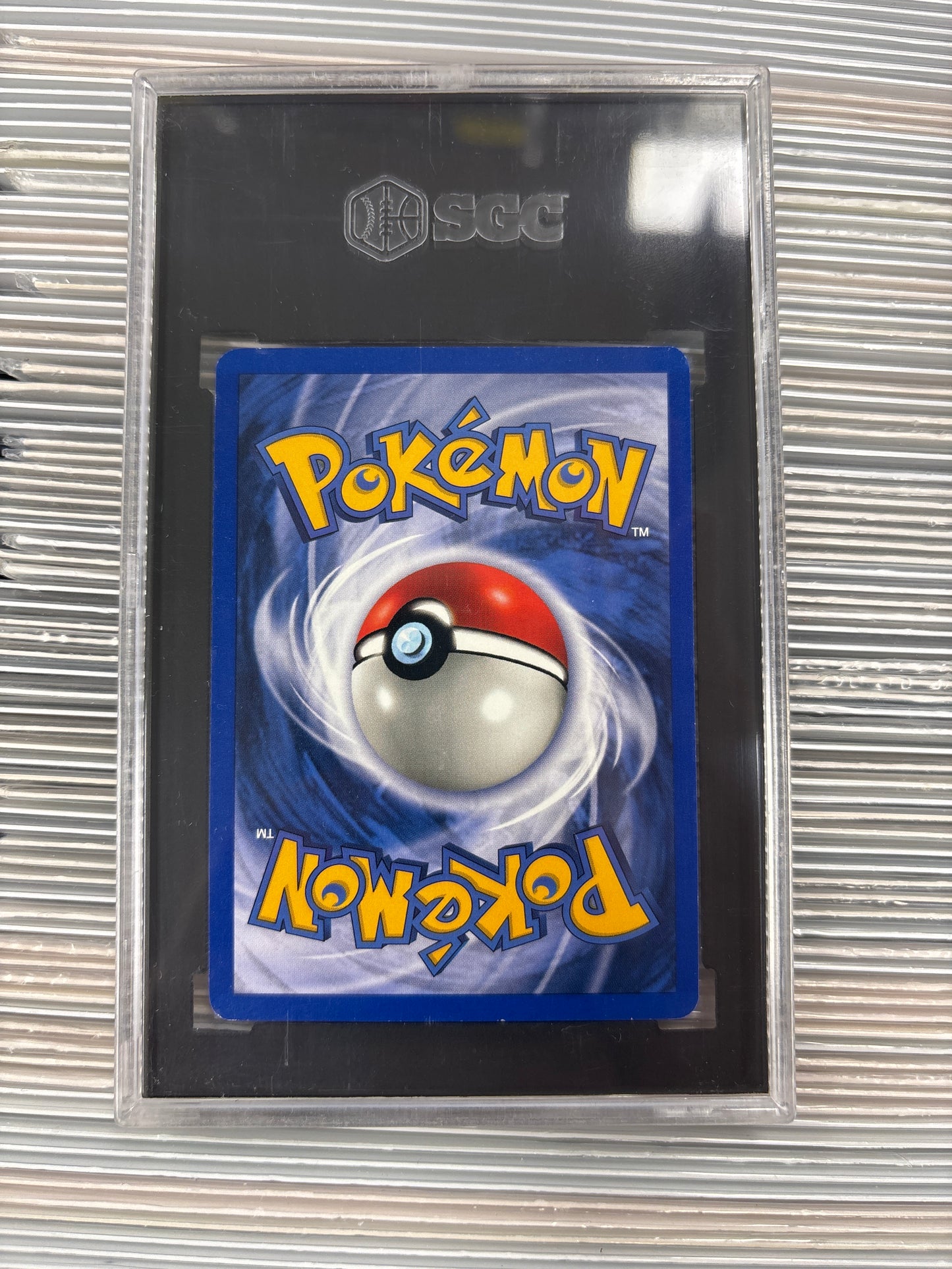 Pokemon Charizard 4/102 (1999) SGC 8.5
