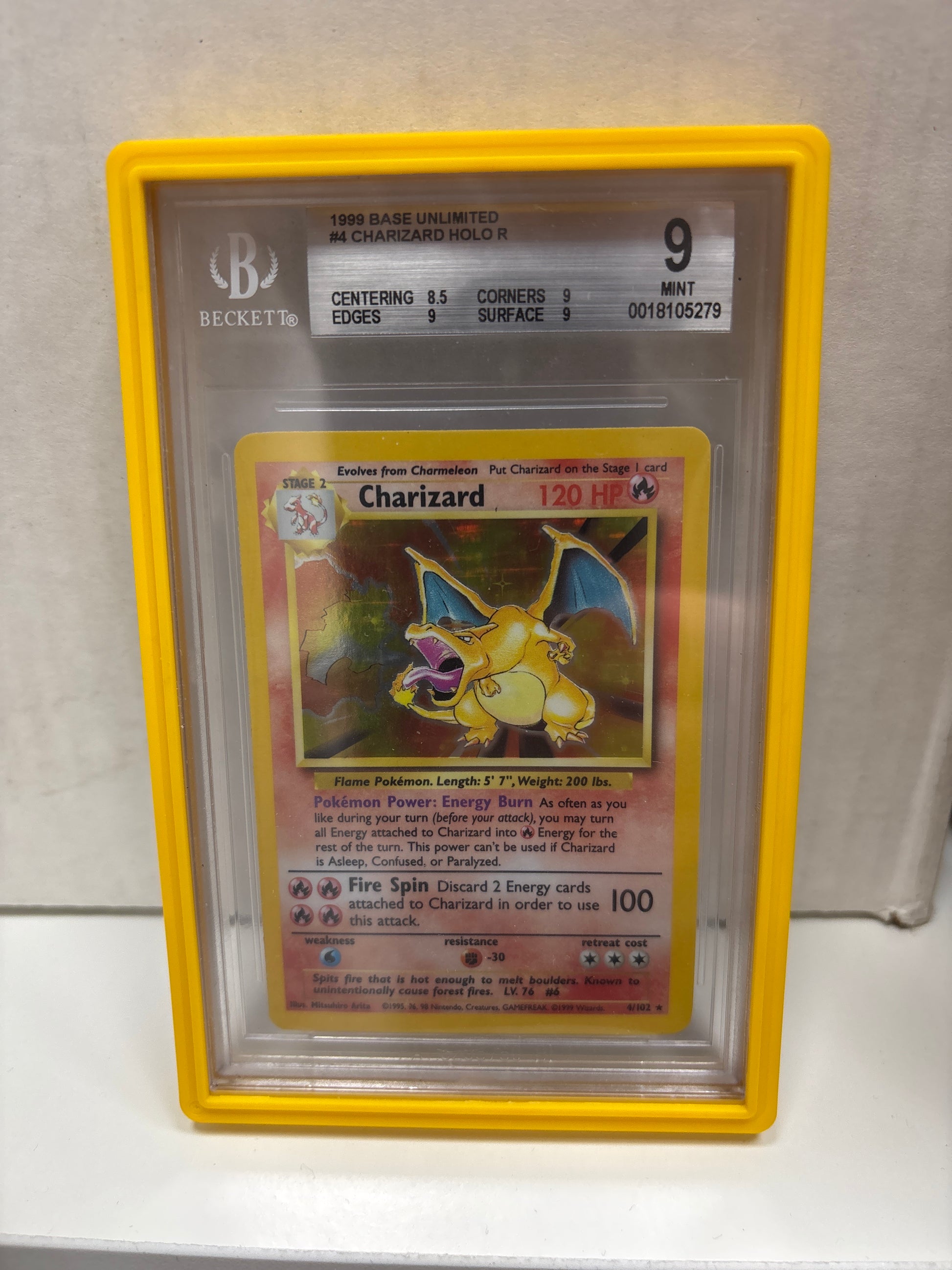 Pokemon Charizard 4/102 (1999) Beckett 9 Zapp! Comics Pokemon Charizard 4/102 (1999) Beckett 9 Zapp! Comics