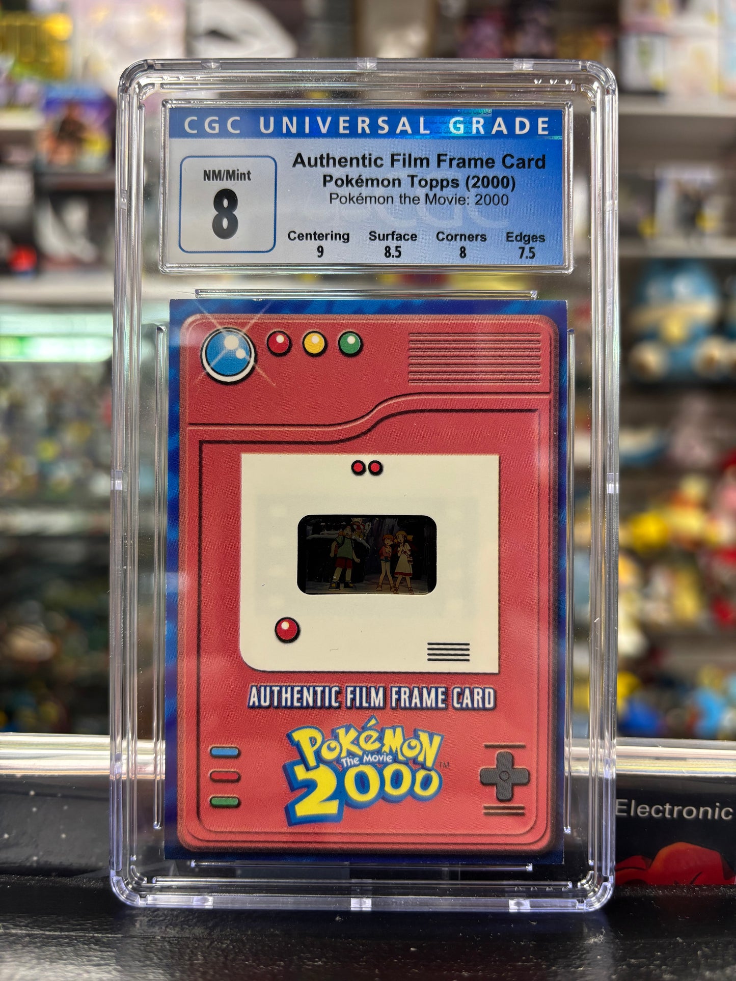 Pokemon Authentic Film Frame Card Topps Pokemon the Movie: 2000 CGC 8