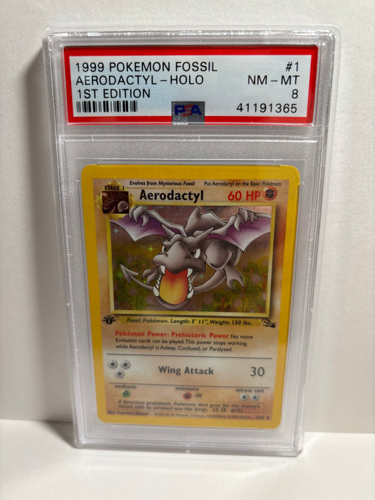 Pokemon Aerodactyl 1/62 1st Edition (1999) PSA 8