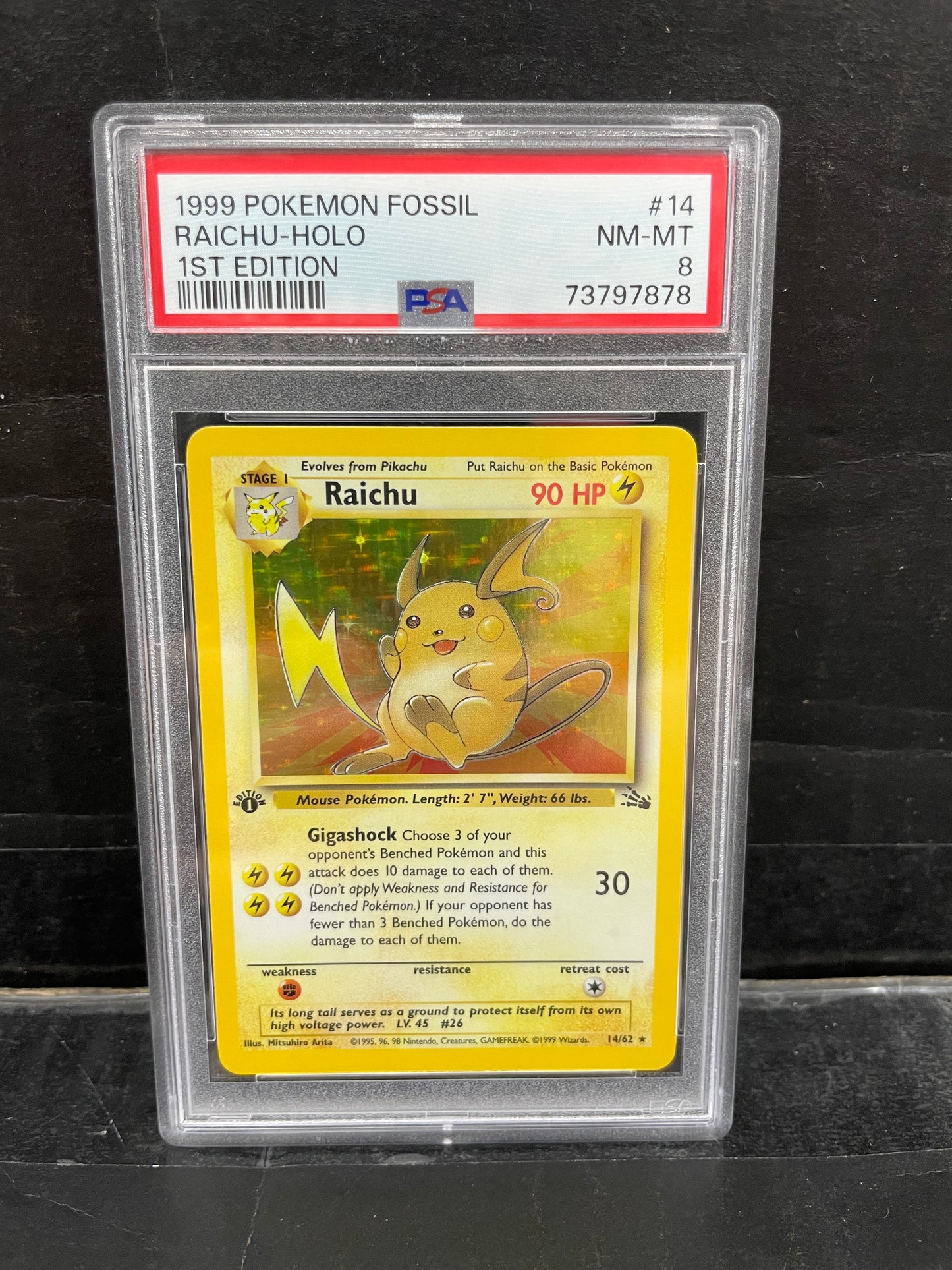 1999 Pokemon Fossil Raichu 1st Edition 14/62 PSA 8